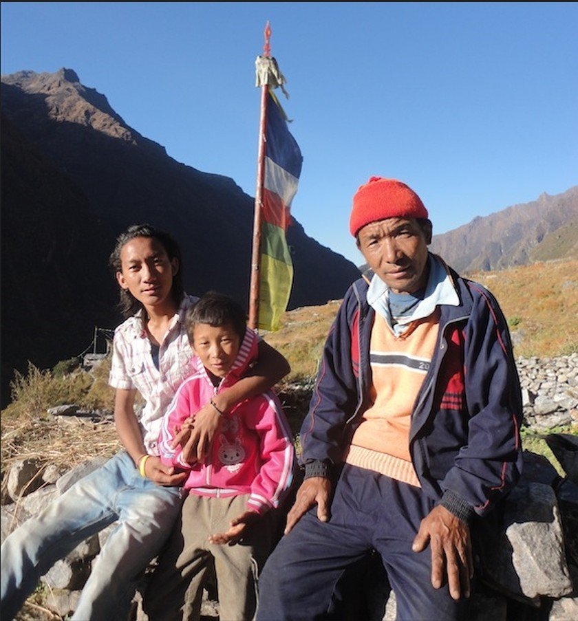 Jalman (middle) at home with his brother and Step Father in Langtang.
