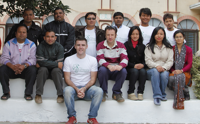Shane (red and white stripes), Macartan (front centre, Umbrella t-shirt) and the local Nepali team November 2011