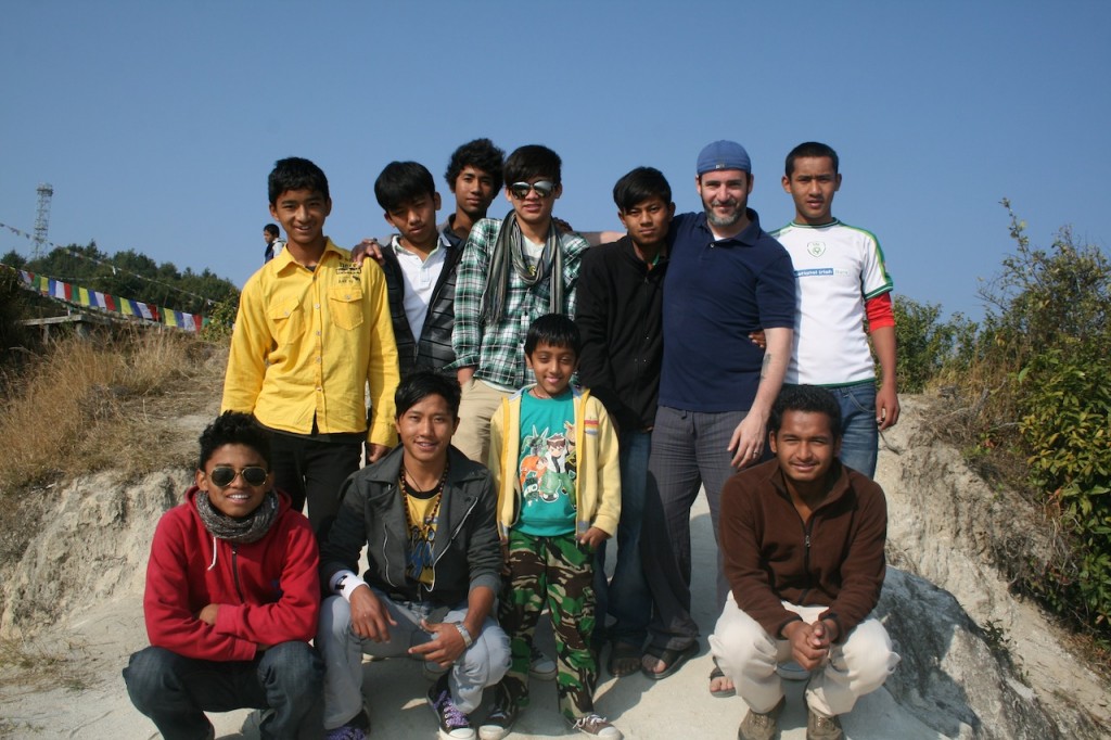Suraj with the boys of Annapurna and volunteer Ivan (US) at the house picnic in 2013.